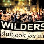 Protest tegen Geert Wilders in Arnhem, met deelnemers van actiegroep Wilders sluit ook jou uit, tijdens een fakkeltocht in de binnenstad.