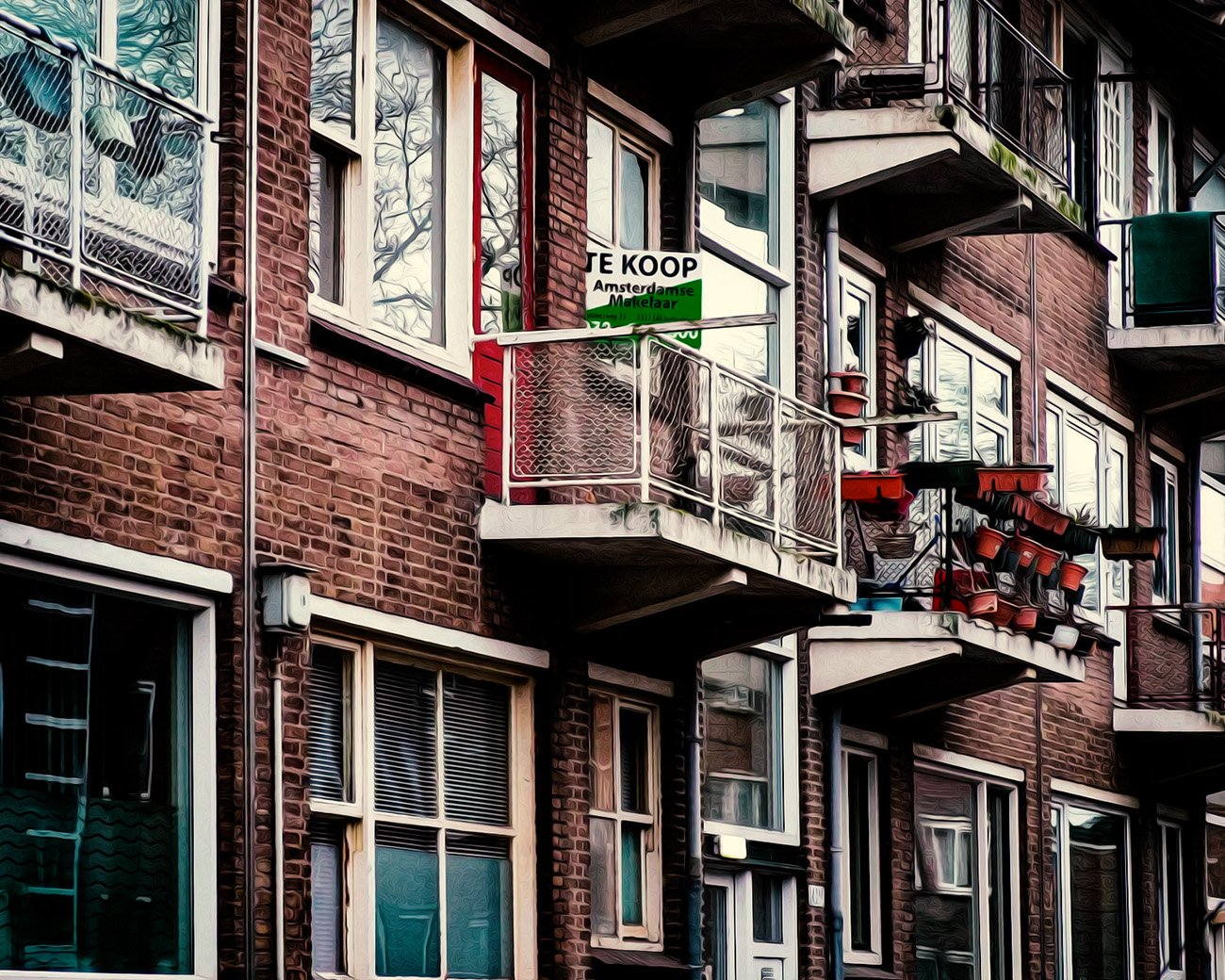 Appartementencomplex met een te-koopbord, als beeld bij een artikel over Vesteda, huurwoningen en de wooncrisis.