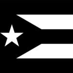 Zwart-witte Puerto Ricaanse vlag met witte ster en strepen als symbool van rouw, verzet en zelfbeschikking.